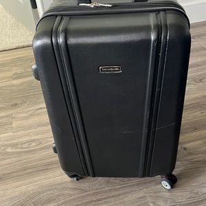 Samsonite Grey Hard shell Luggage.Beige interior.